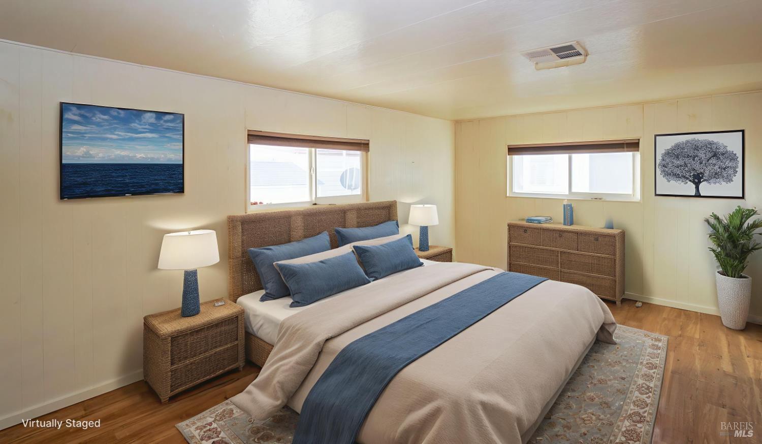 2412 Foothill Boulevard, Unit 124 Calistoga, CA 94515 - Photo 37 of 49 a bedroom with a bed and a couch