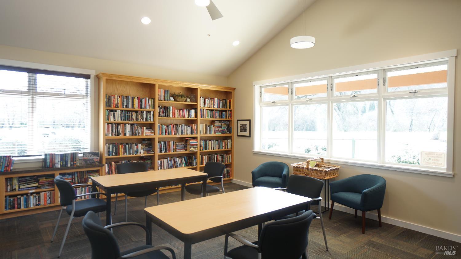 2412 Foothill Boulevard, Unit 124 Calistoga, CA 94515 - Photo 45 of 49 a view of a workspace with furniture and a large window in a room