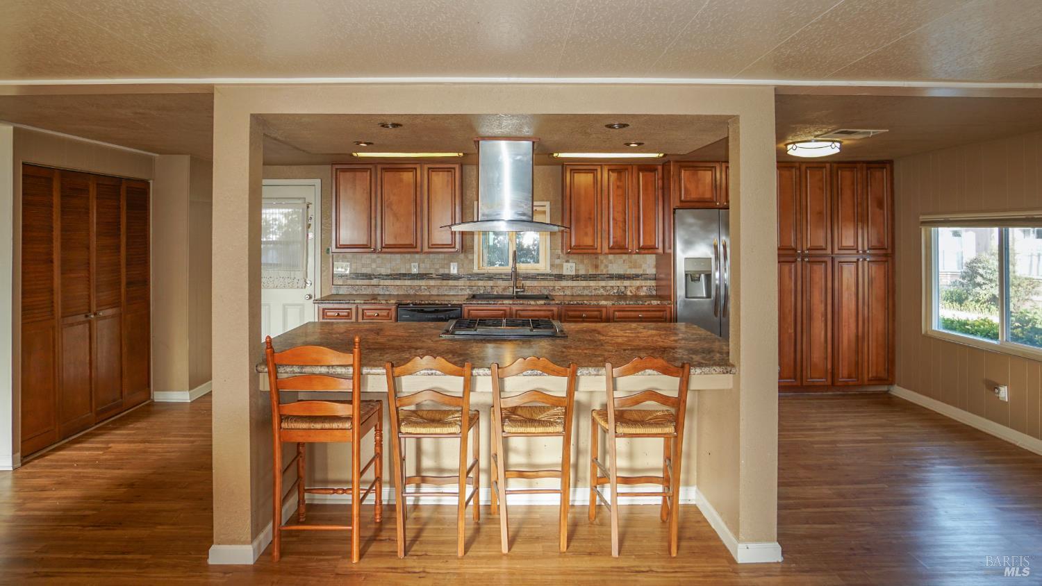 2412 Foothill Boulevard, Unit 124 Calistoga, CA 94515 - Photo 7 of 29 a view of a livingroom with furniture wooden floor and front door