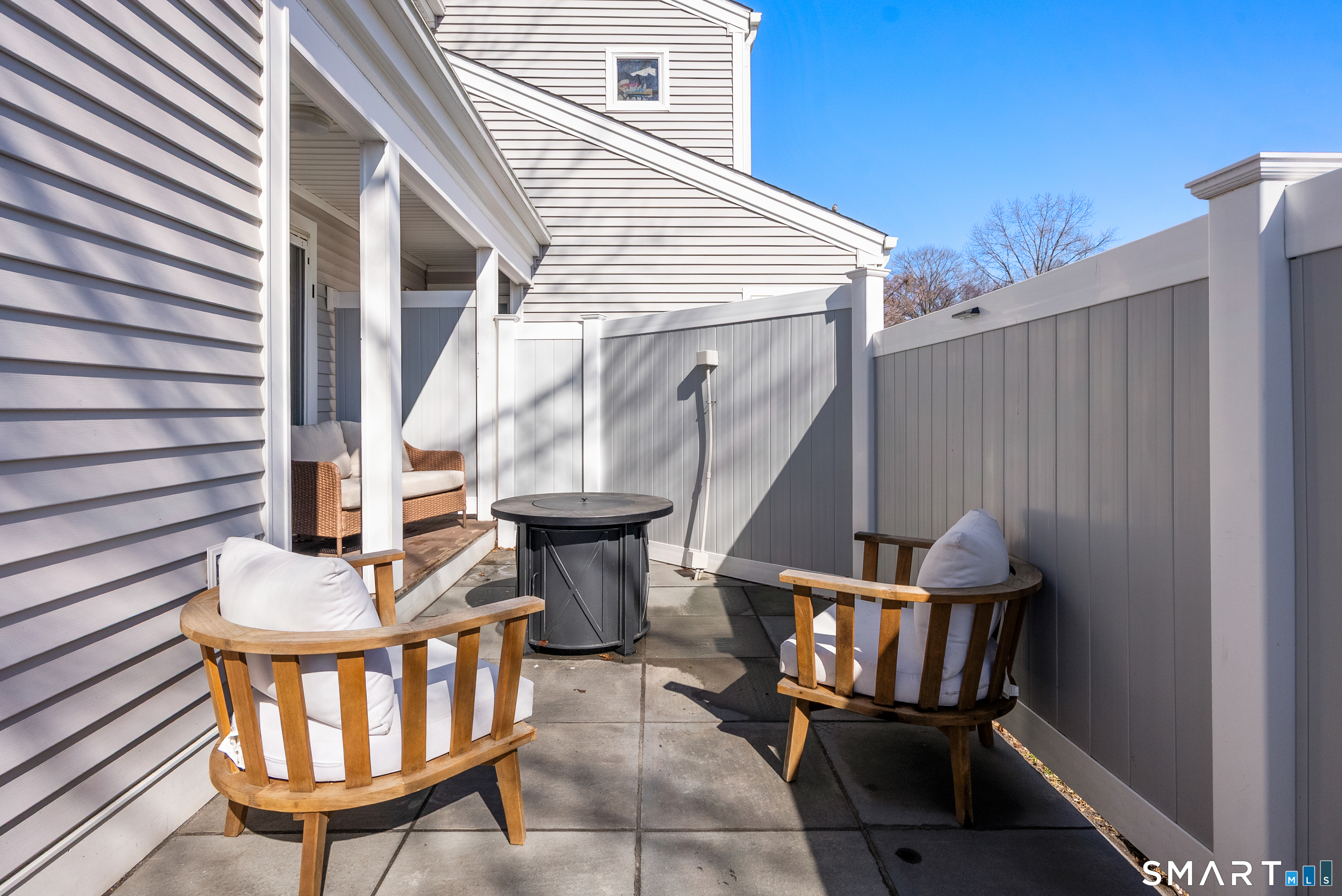 175 South End Road, Unit B10 East Haven, CT 06512 - Photo 28 of 32 a view of a chairs and table in the balcony