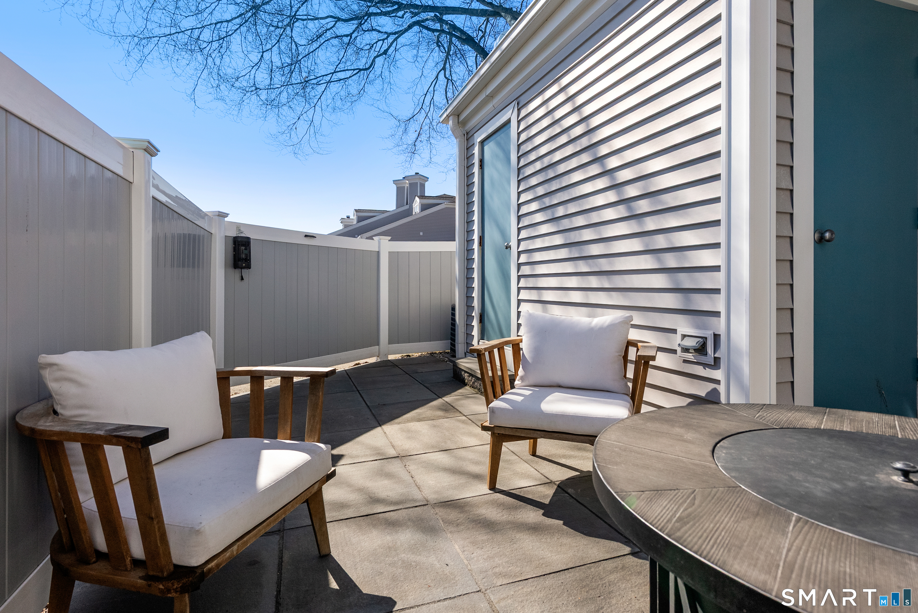 175 South End Road, Unit B10 East Haven, CT 06512 - Photo 29 of 32 a building outdoor space with patio furniture
