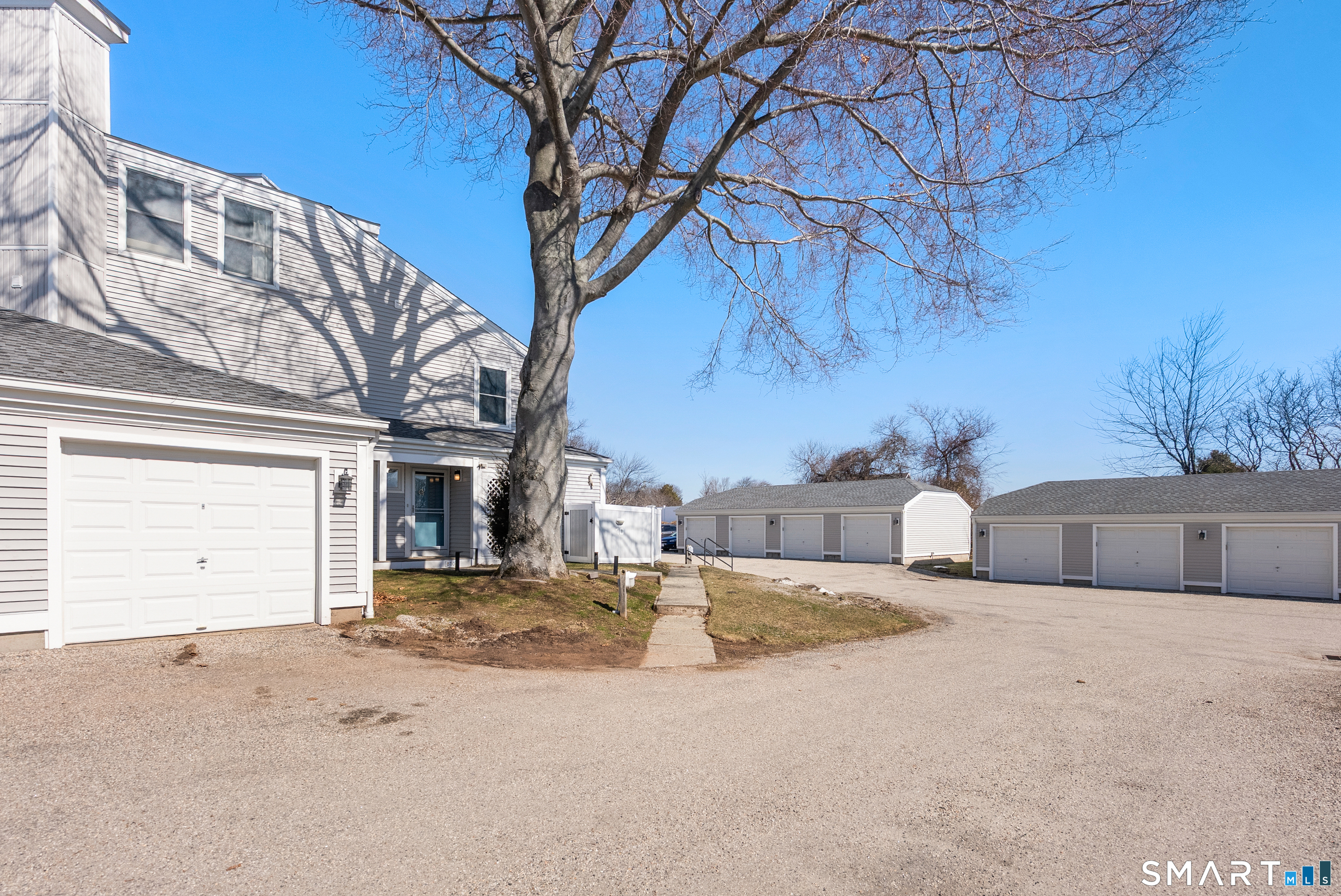 175 South End Road, Unit B10 East Haven, CT 06512 - Photo 32 of 32 a view of a house with a snow in the yard