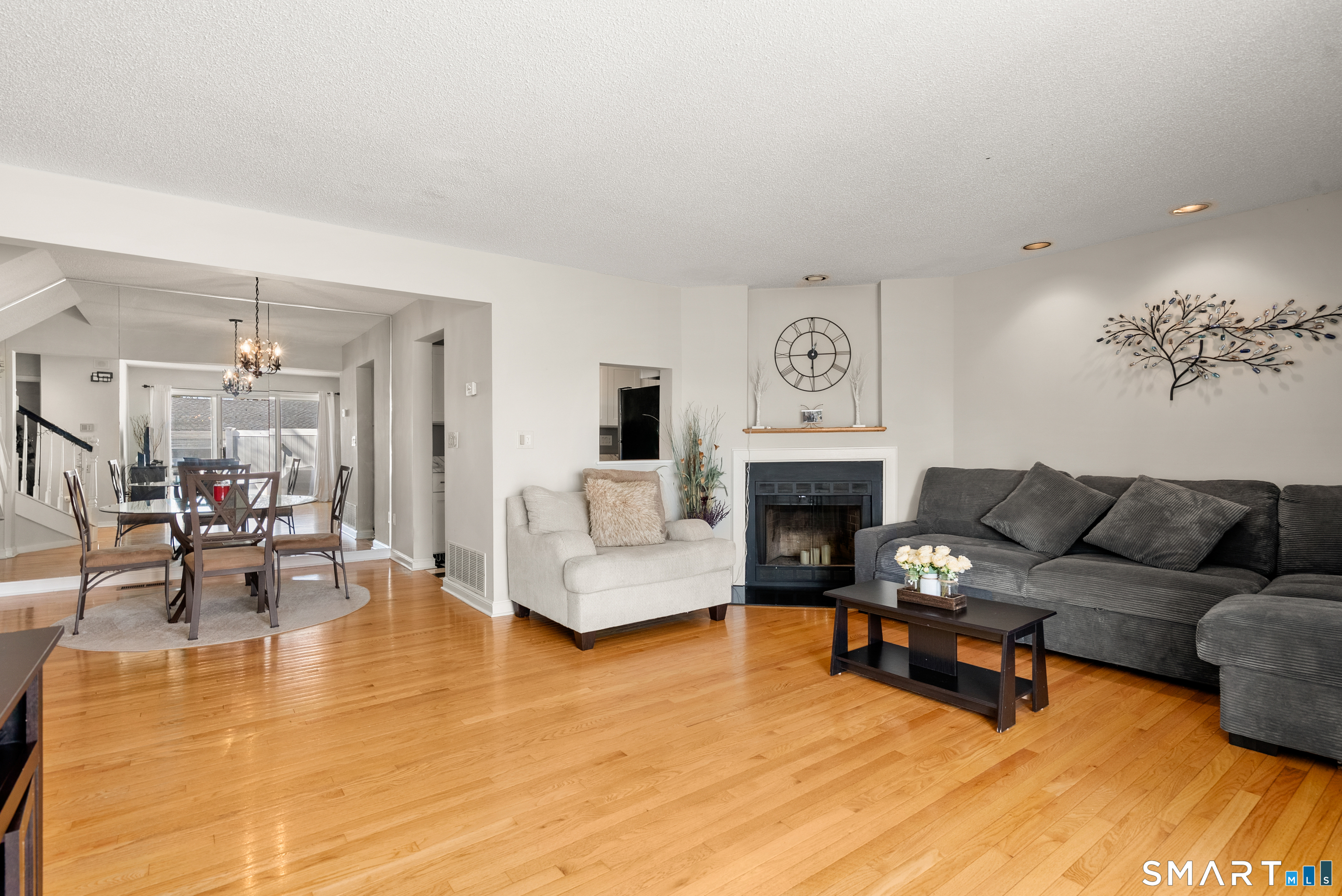 175 South End Road, Unit B10 East Haven, CT 06512 - Photo 5 of 32 a living room with furniture and a fireplace