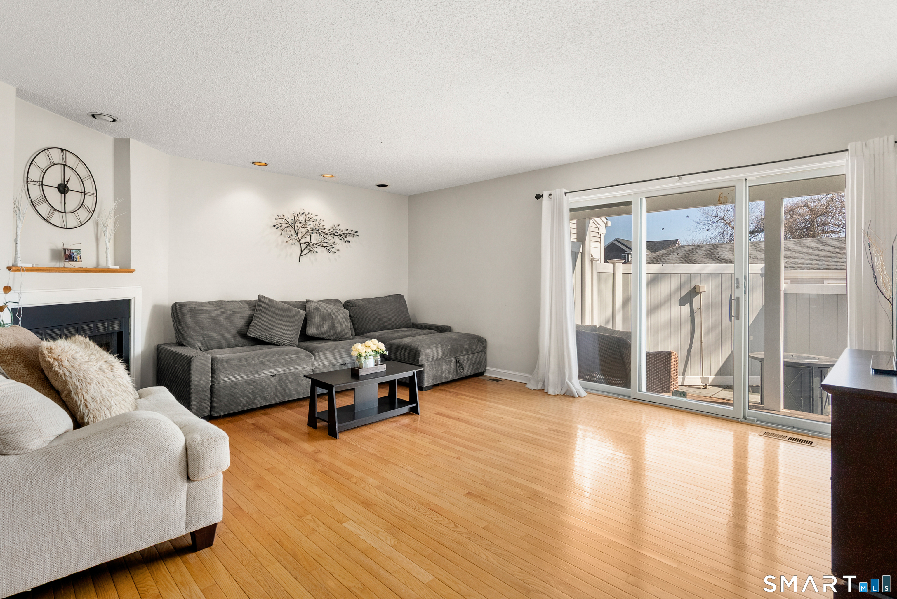 175 South End Road, Unit B10 East Haven, CT 06512 - Photo 6 of 32 a living room with furniture and a large window