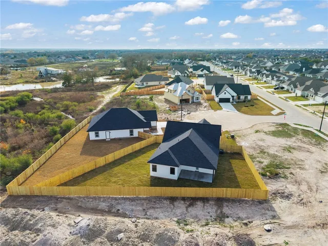 a view of a lake in front of house