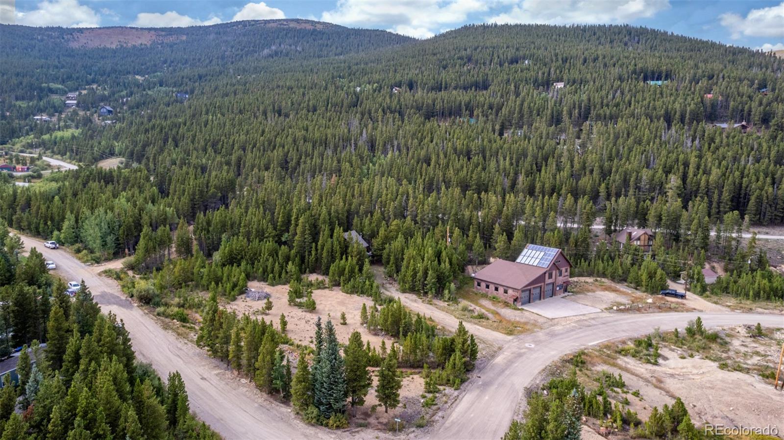 Beaver Road Idaho Springs, CO 80452 - Photo 31 of 50 a view of a chairs and table in backyard