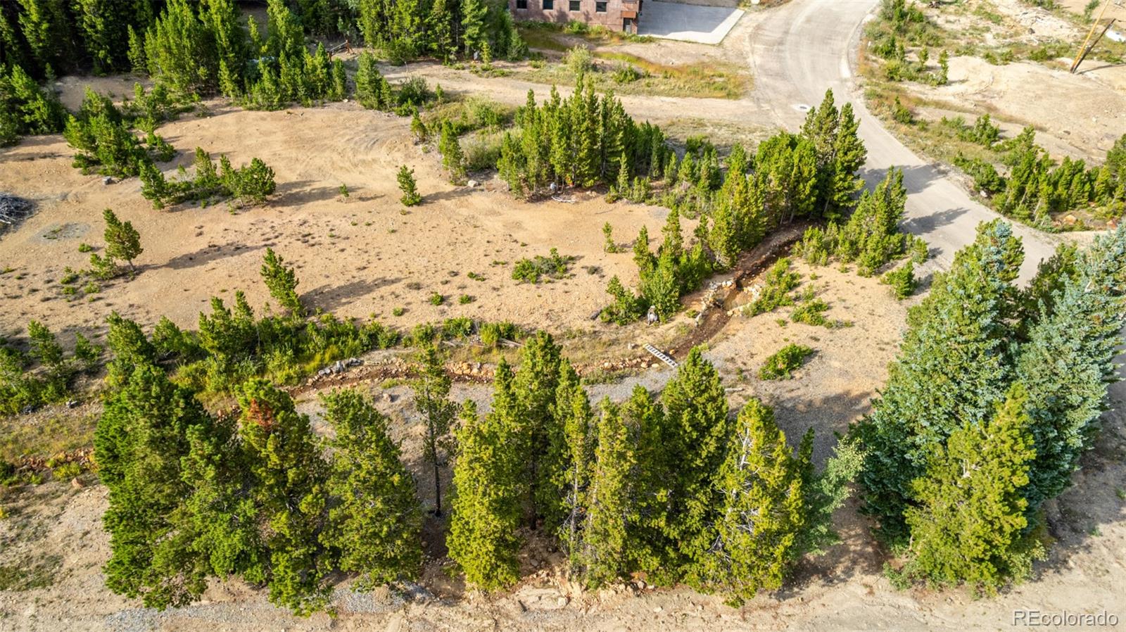 Beaver Road Idaho Springs, CO 80452 - Photo 37 of 50 a view of a yard covered in snow