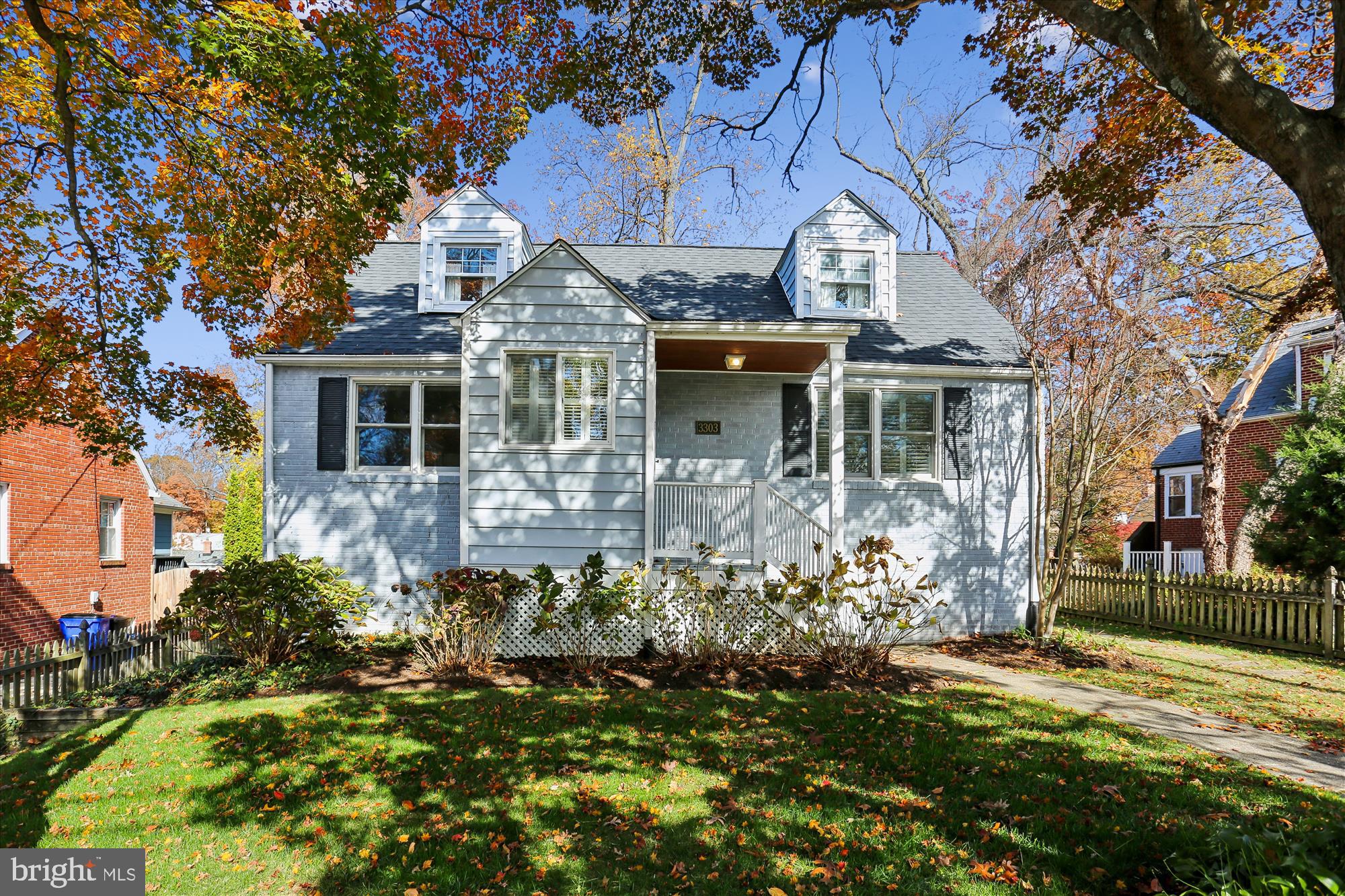 front view of a house with a yard
