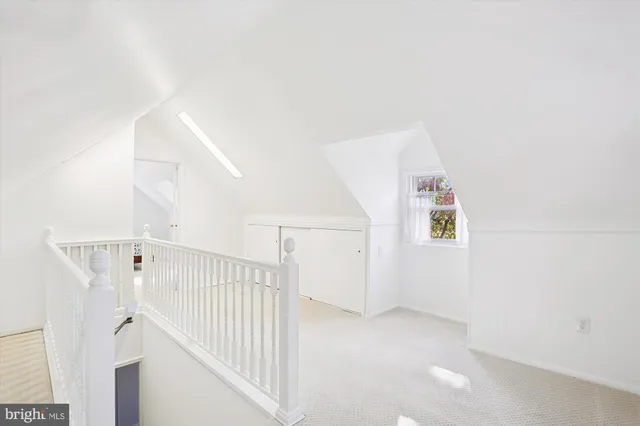 a view of a livingroom with white walls