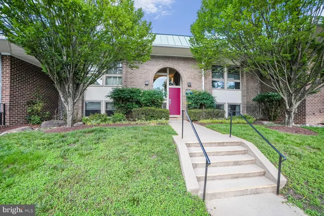 a view of swimming pool with a yard