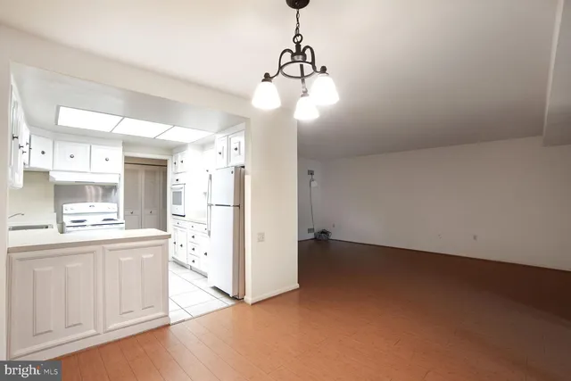 a view of a kitchen with a sink