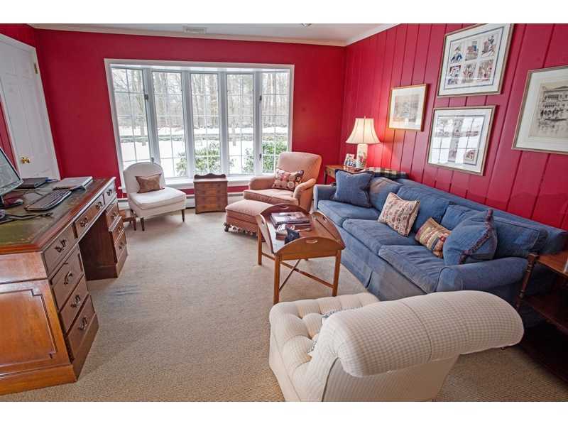 201 Michigan Road New Canaan, CT 06840 - Photo 12 of 25 a living room with furniture and a large window