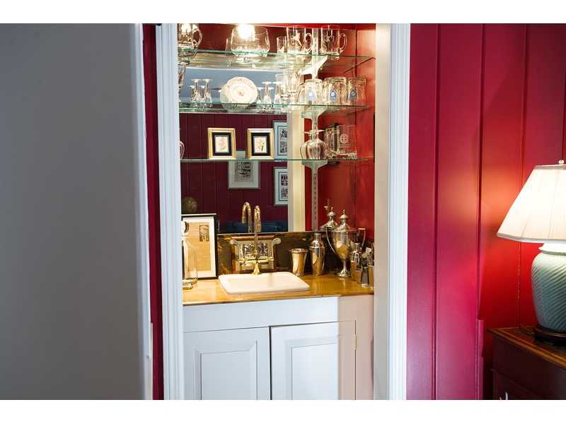 201 Michigan Road New Canaan, CT 06840 - Photo 13 of 25 a bathroom with a sink and a mirror