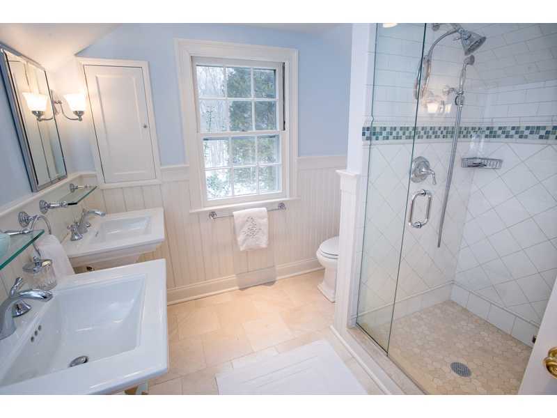 201 Michigan Road New Canaan, CT 06840 - Photo 15 of 25 a bathroom with a sink a toilet and shower