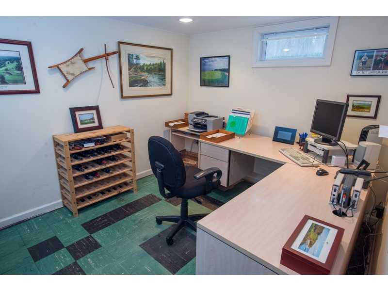 201 Michigan Road New Canaan, CT 06840 - Photo 19 of 25 a view of a workspace with furniture and a workspace