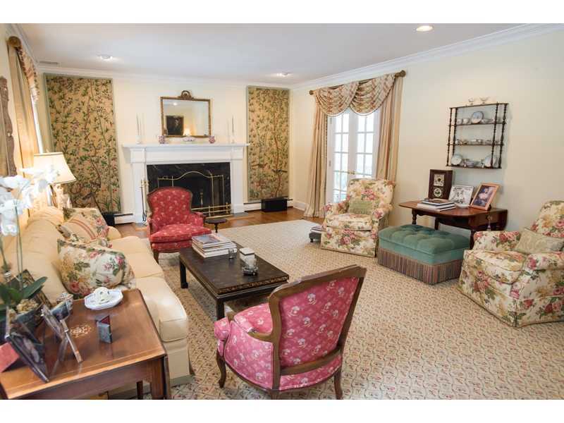 201 Michigan Road New Canaan, CT 06840 - Photo 3 of 25 a living room with furniture and a fireplace