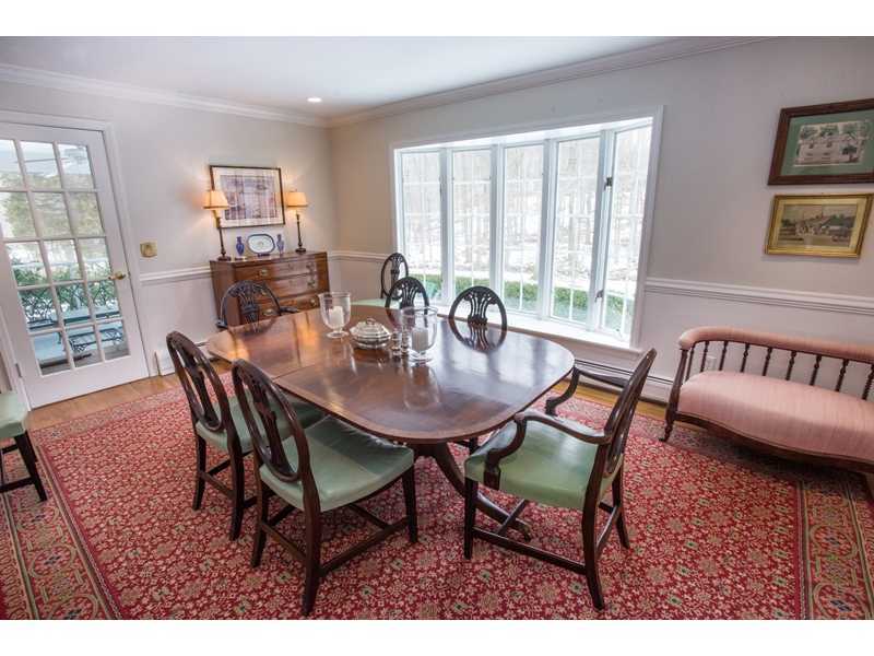 201 Michigan Road New Canaan, CT 06840 - Photo 5 of 25 a view of a dining room with furniture and a table