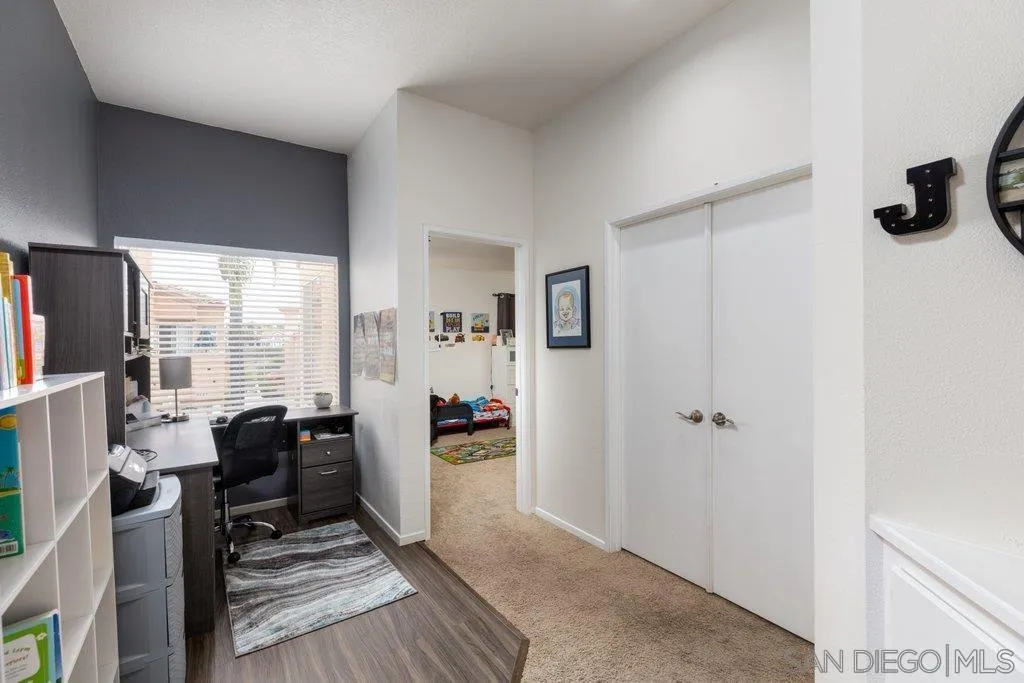 1352 Serena Circle, Unit 2 Chula Vista, CA 91910 - Photo 12 of 22 a view of a livingroom with furniture and windows