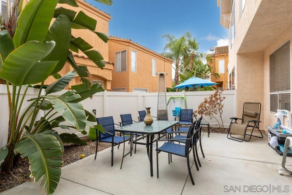 1352 Serena Circle, Unit 2 Chula Vista, CA 91910 - Photo 7 of 22 a view of an outdoor dining space with a table and chairs