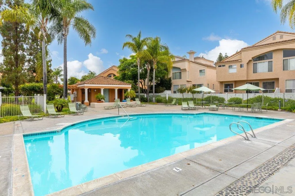 1352 Serena Circle, Unit 2 Chula Vista, CA 91910 - Photo 9 of 22 a front view of house with yard and swimming pool