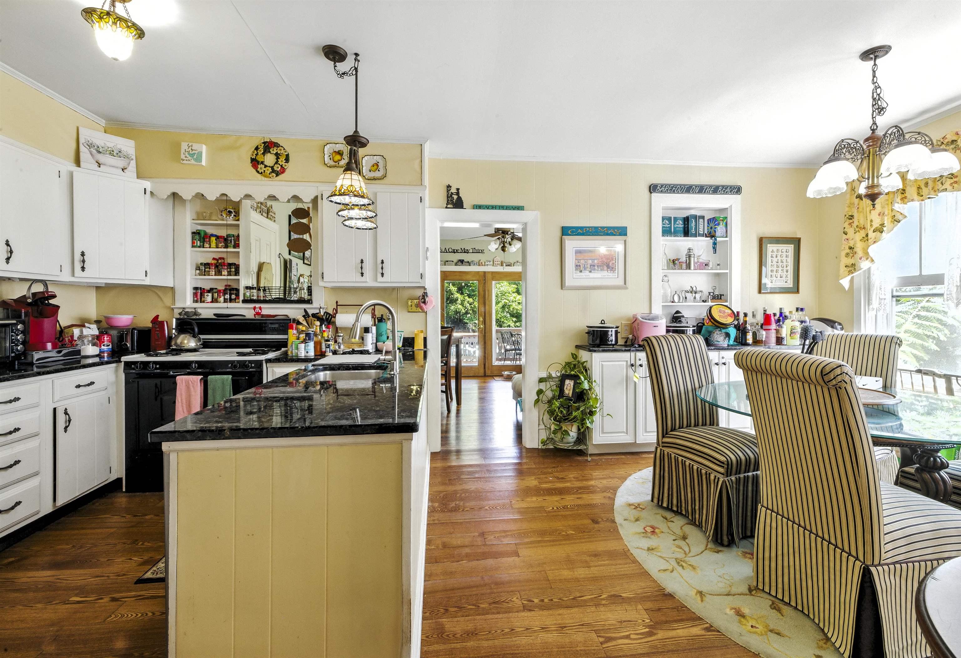 35 1st Cape May, NJ 08204 - Photo 14 of 49 a view of a kitchen and dining room