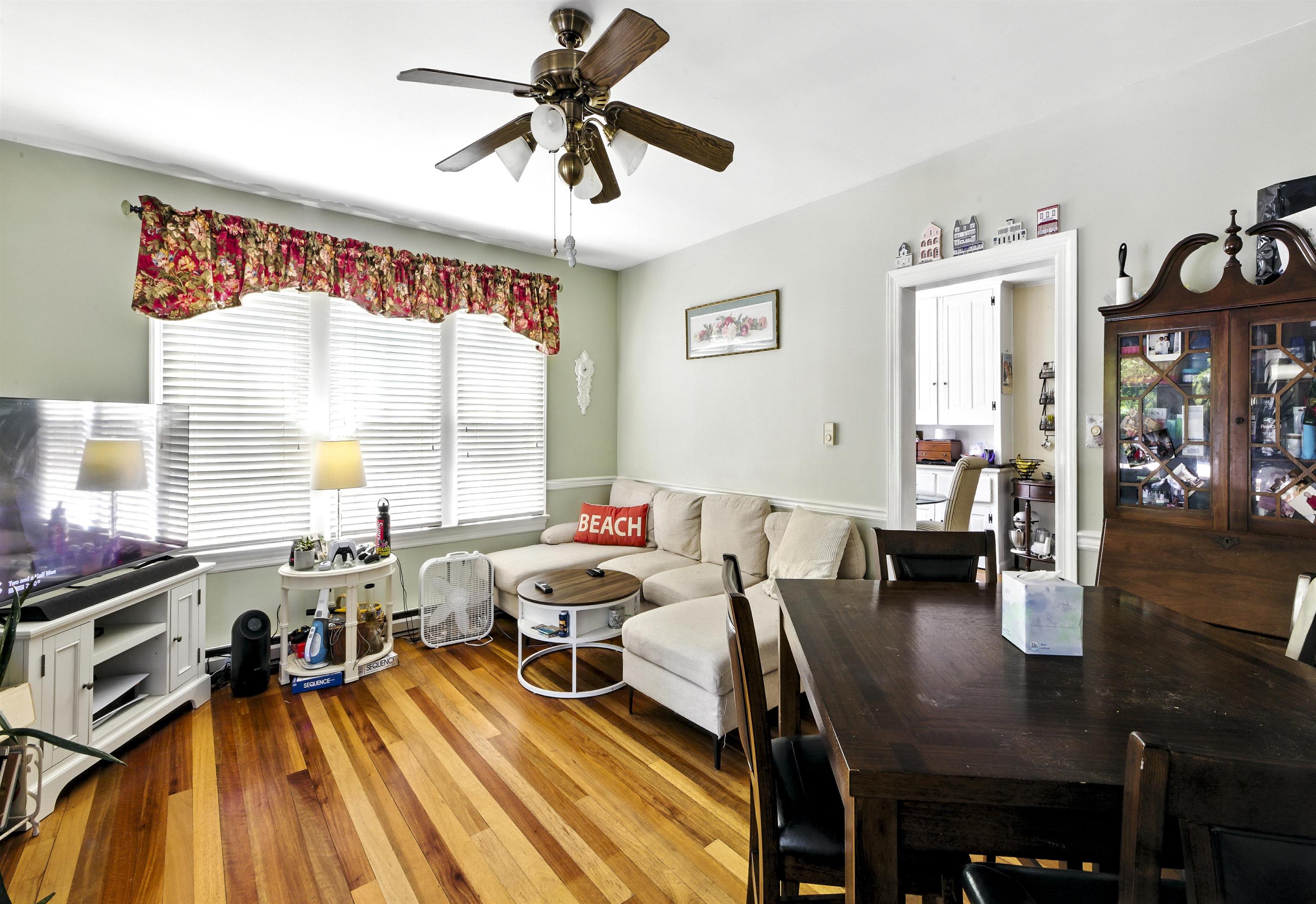 35 1st Cape May, NJ 08204 - Photo 17 of 49 a living room with furniture and a large window