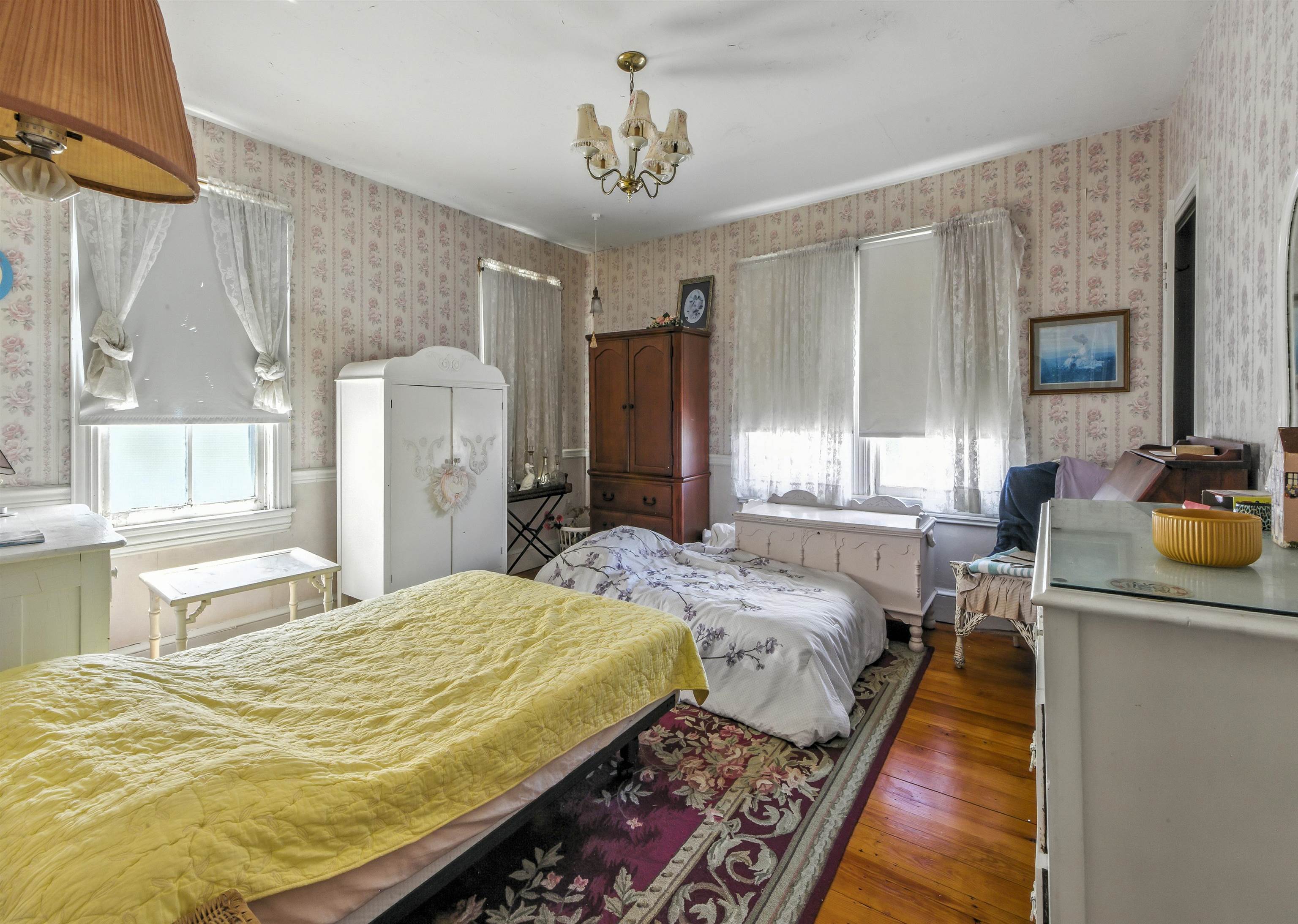 35 1st Cape May, NJ 08204 - Photo 28 of 49 a bed sitting in a bedroom next to a window