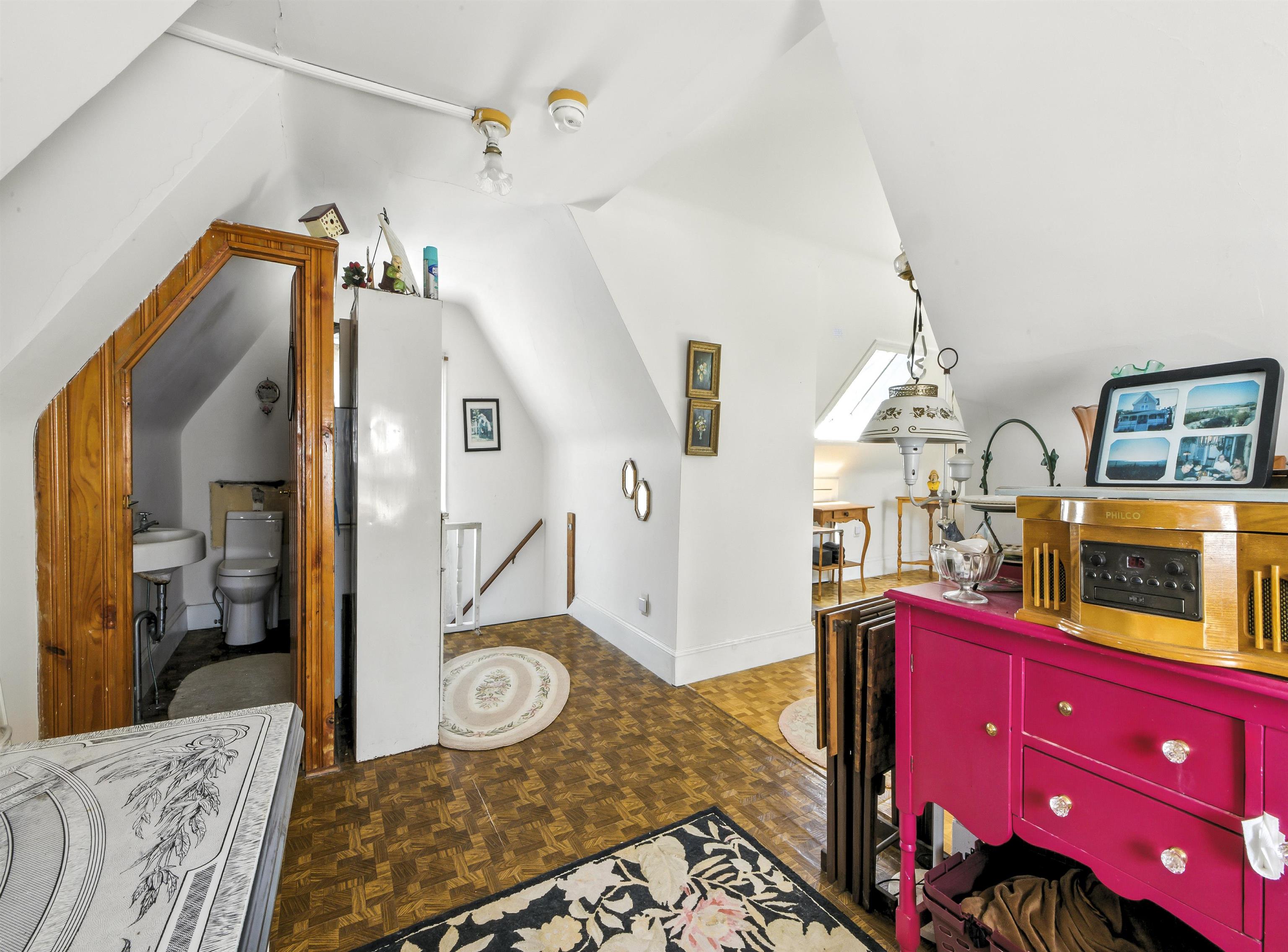 35 1st Cape May, NJ 08204 - Photo 32 of 49 a bedroom with furniture and a mirror