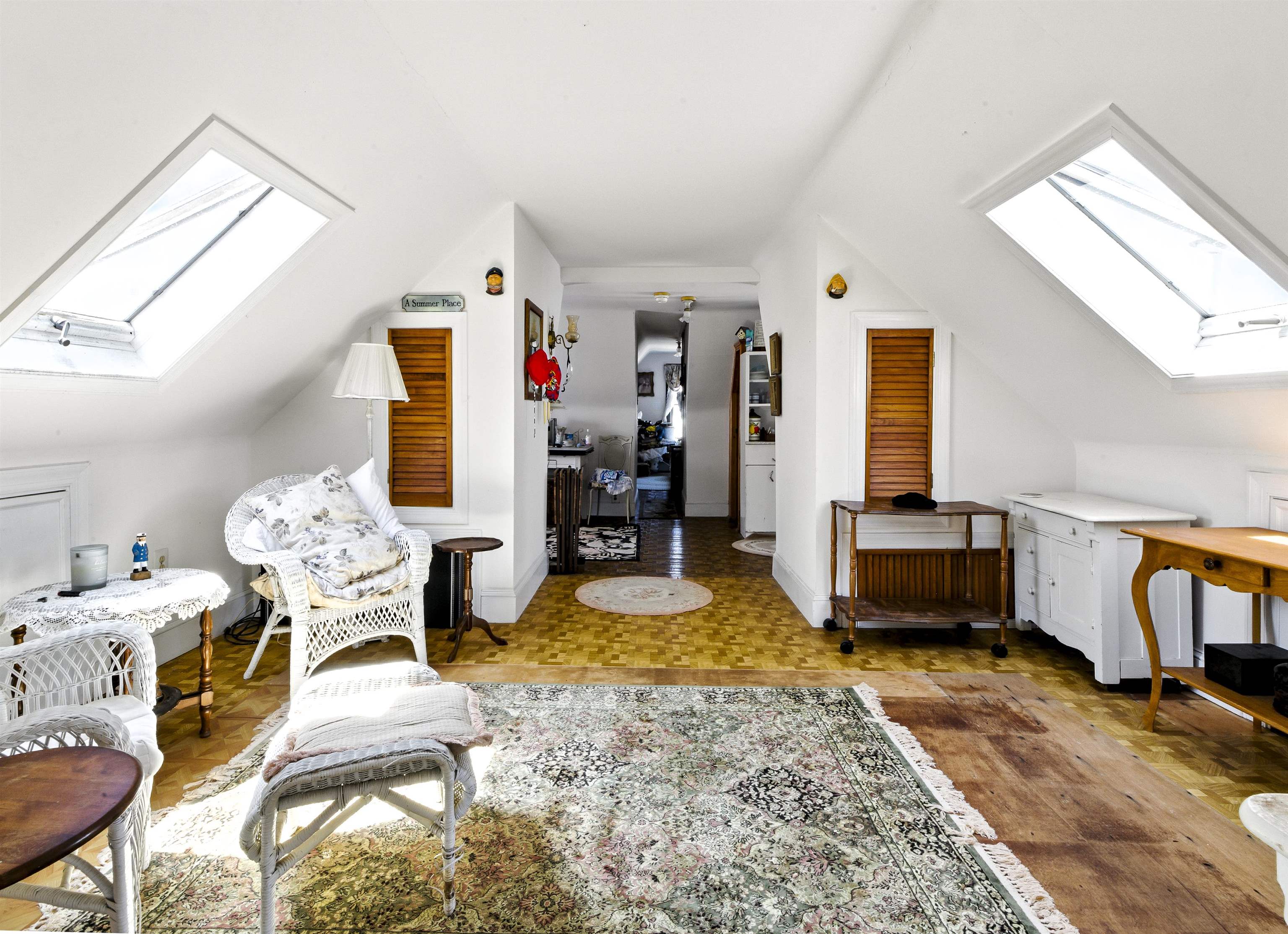 35 1st Cape May, NJ 08204 - Photo 33 of 49 a living room with furniture and a wooden floor
