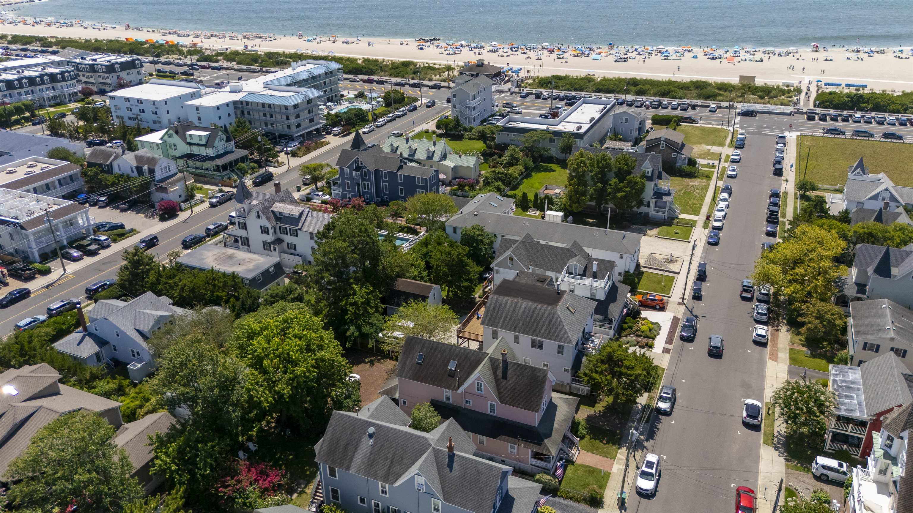 35 1st Cape May, NJ 08204 - Photo 40 of 49 an aerial view of house with yard swimming pool and ocean view