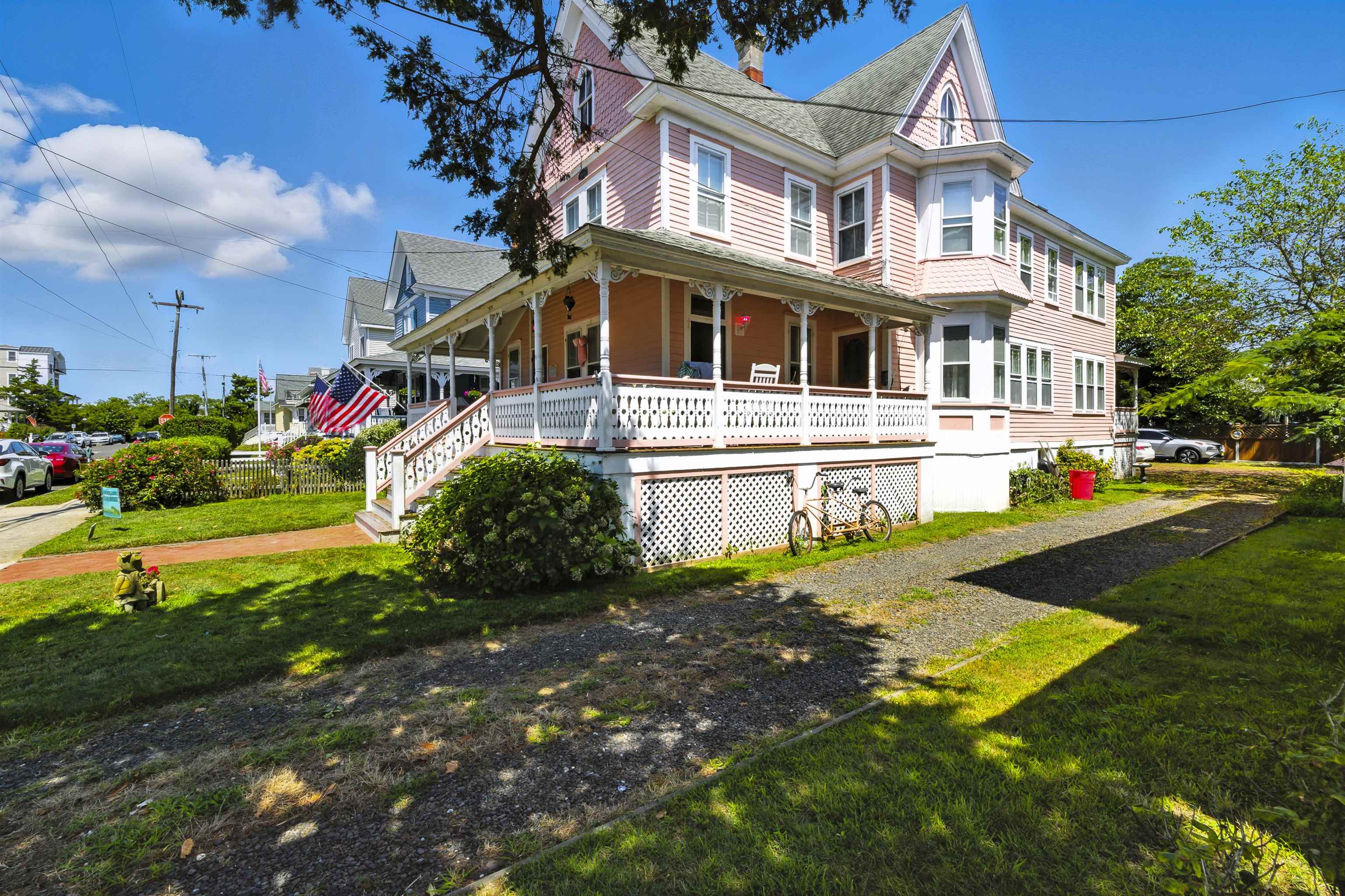 35 1st Cape May, NJ 08204 - Photo 4 of 49 a front view of a house with a yard