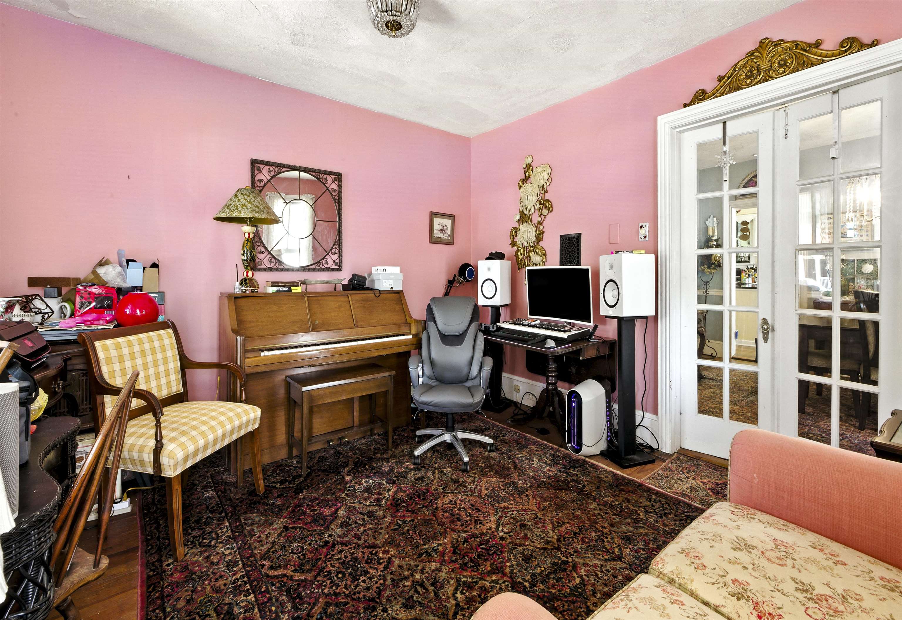 35 1st Cape May, NJ 08204 - Photo 8 of 49 a living room with furniture and a flat screen tv