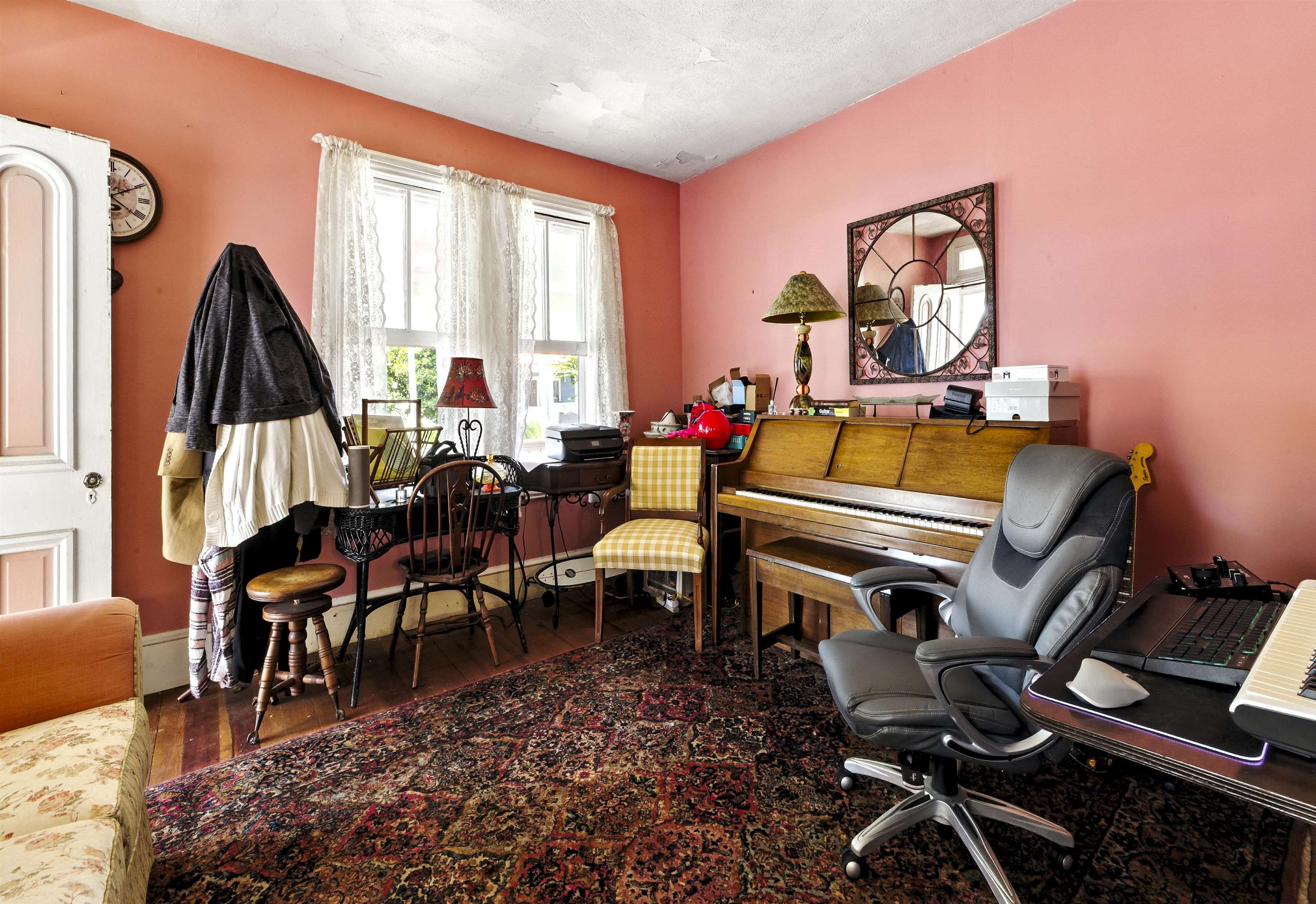 35 1st Cape May, NJ 08204 - Photo 10 of 49 a living room with furniture a rug and a window