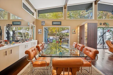 a dining room filled with furniture