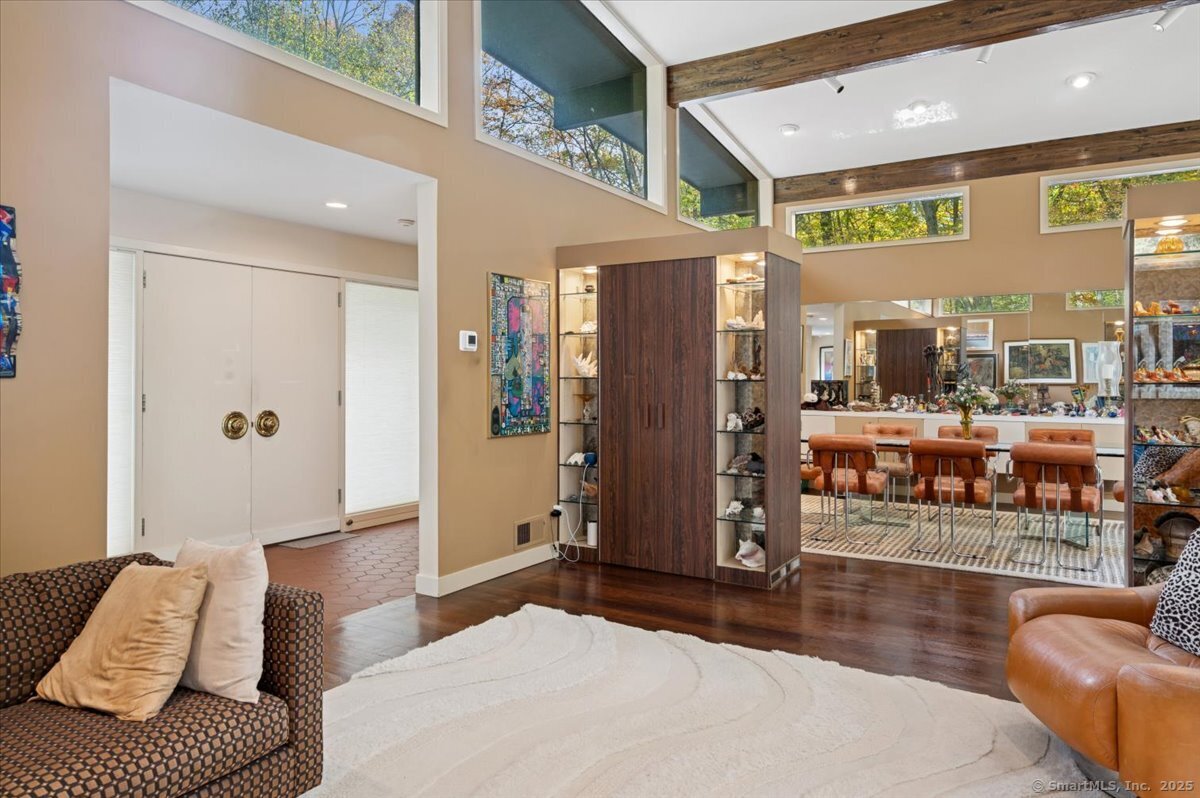 100 East Common Road Easton, CT 06612 - Photo 7 of 25 a bedroom with furniture and a couch