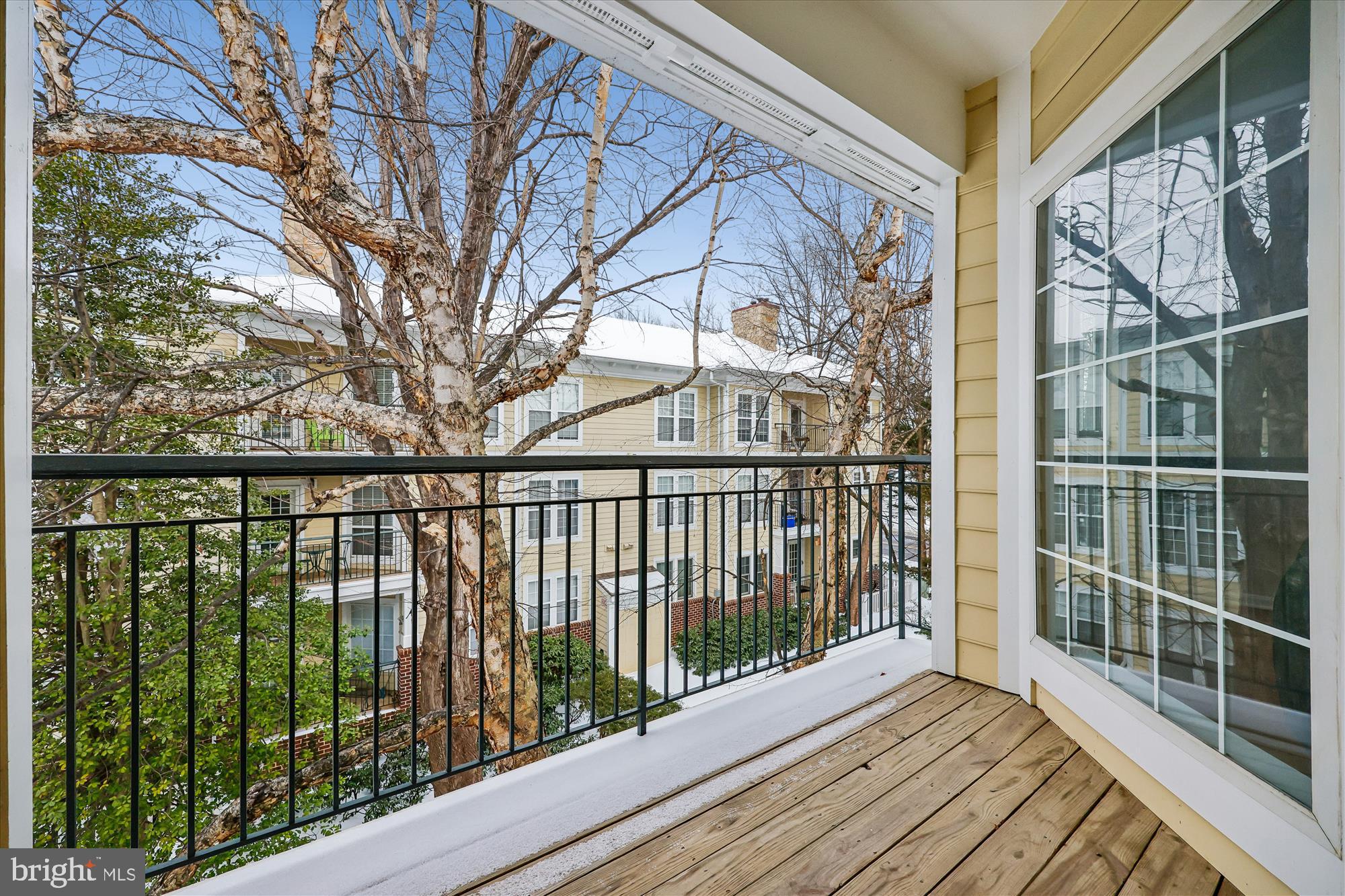106 Booth Street, Unit 34 Gaithersburg, MD 20878 - Photo 11 of 46 a view of balcony with wooden floor