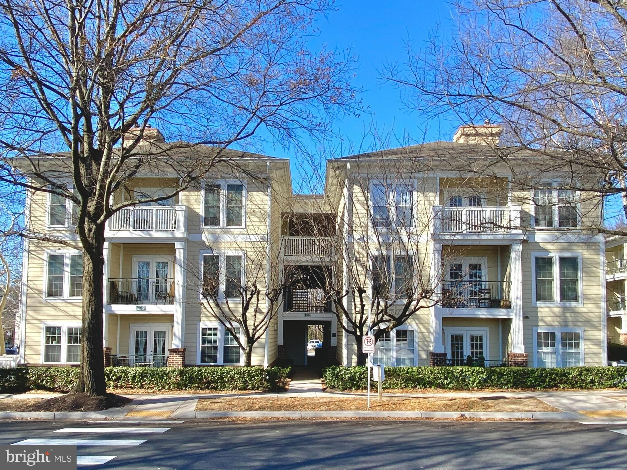 106 Booth Street, Unit 34 Gaithersburg, MD 20878 - Photo 23 of 46 a view of a brick building next to a road