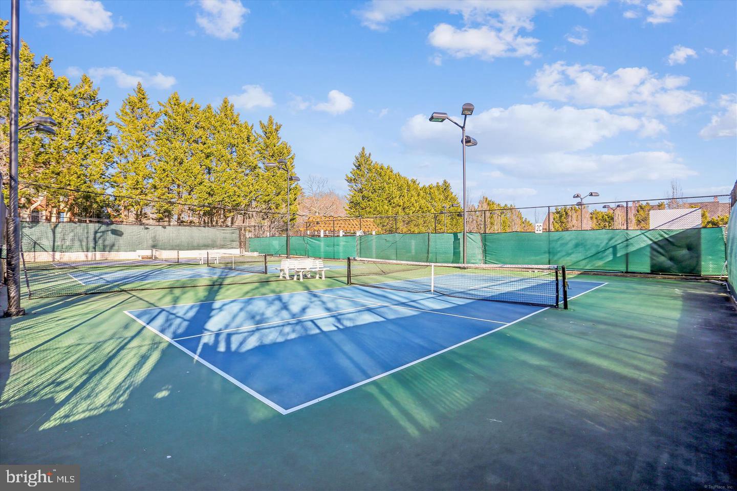106 Booth Street, Unit 34 Gaithersburg, MD 20878 - Photo 30 of 46 a view of a tennis court