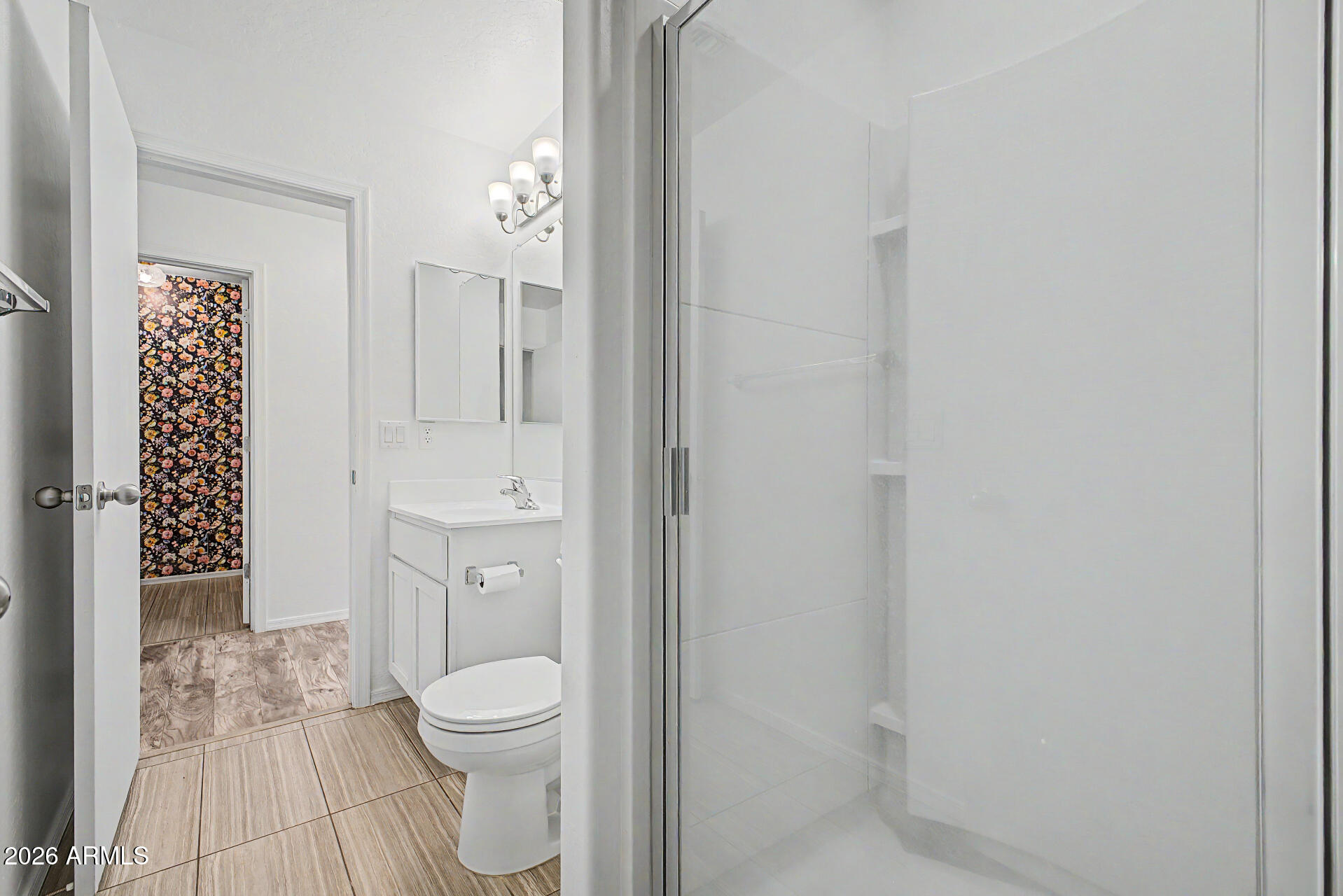 1882 West Rd Agent Street Apache Junction, AZ 85120 - Photo 20 of 26 a bathroom with a toilet a sink and mirror