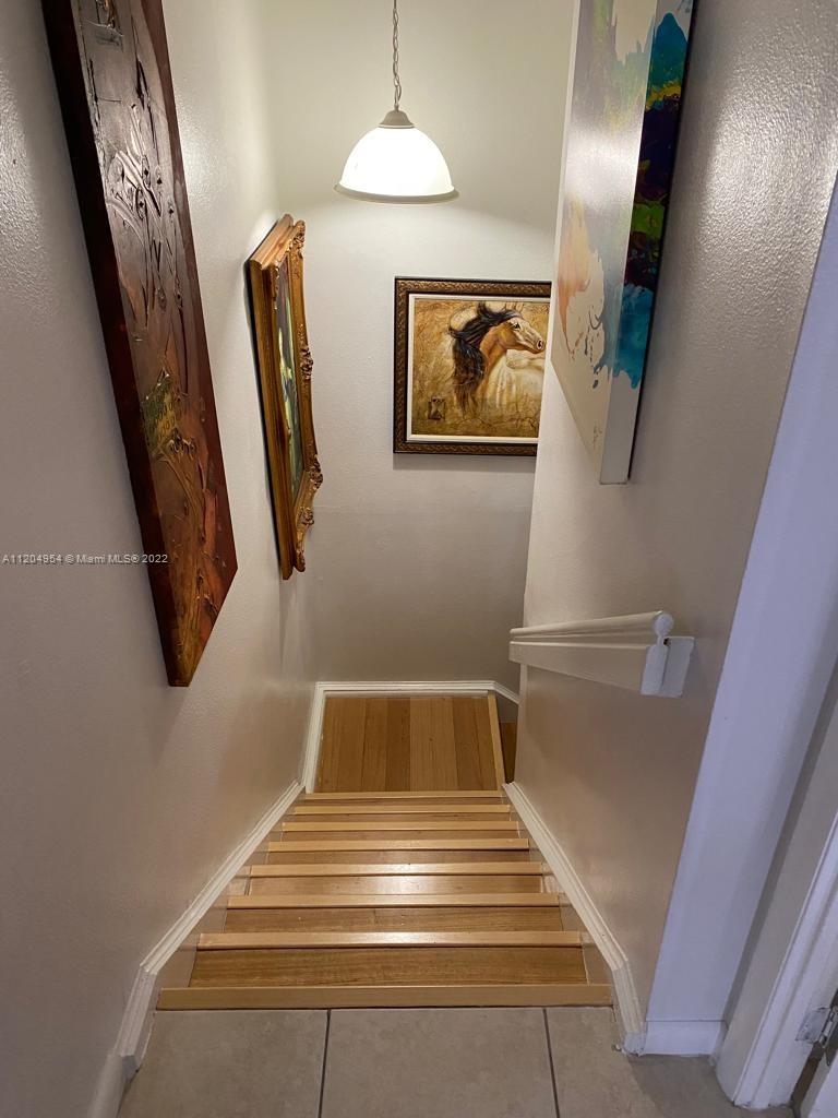 17901 Northwest 68th Avenue, Unit T207 Hialeah, FL 33015 - Photo 17 of 19 a view of entryway