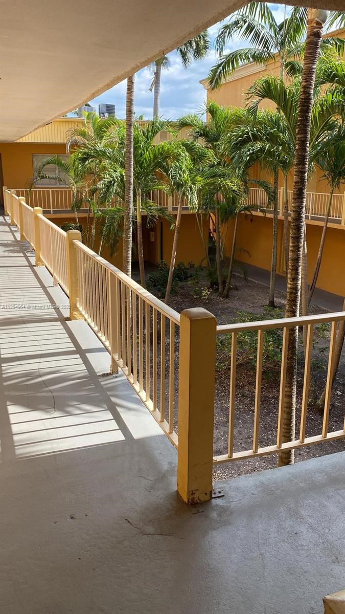 17901 Northwest 68th Avenue, Unit T207 Hialeah, FL 33015 - Photo 19 of 19 a view of a balcony