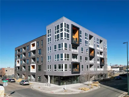 a front view of a building with street view