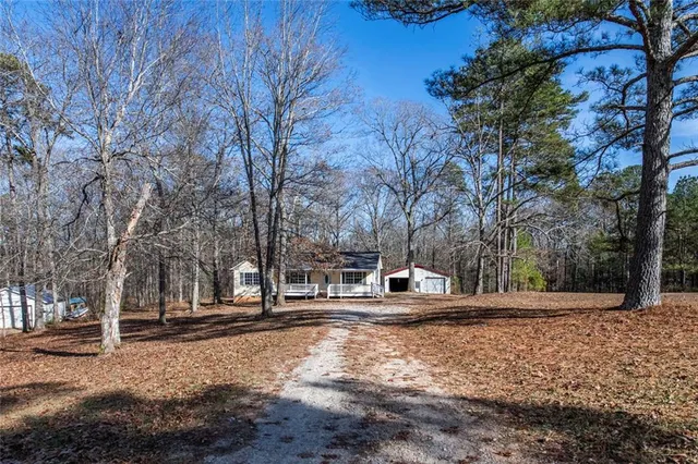 a house with trees in front of it