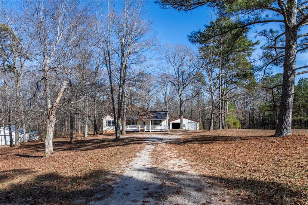 a house with trees in front of it