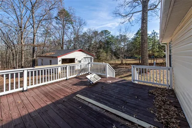 a balcony with wooden floor