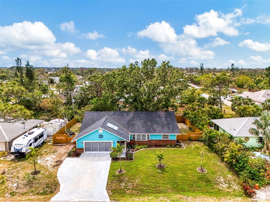 1137 Ponderosa Road Venice, FL 34293 - Photo 43 of 48 an aerial view of a house with a yard basket ball court and outdoor seating
