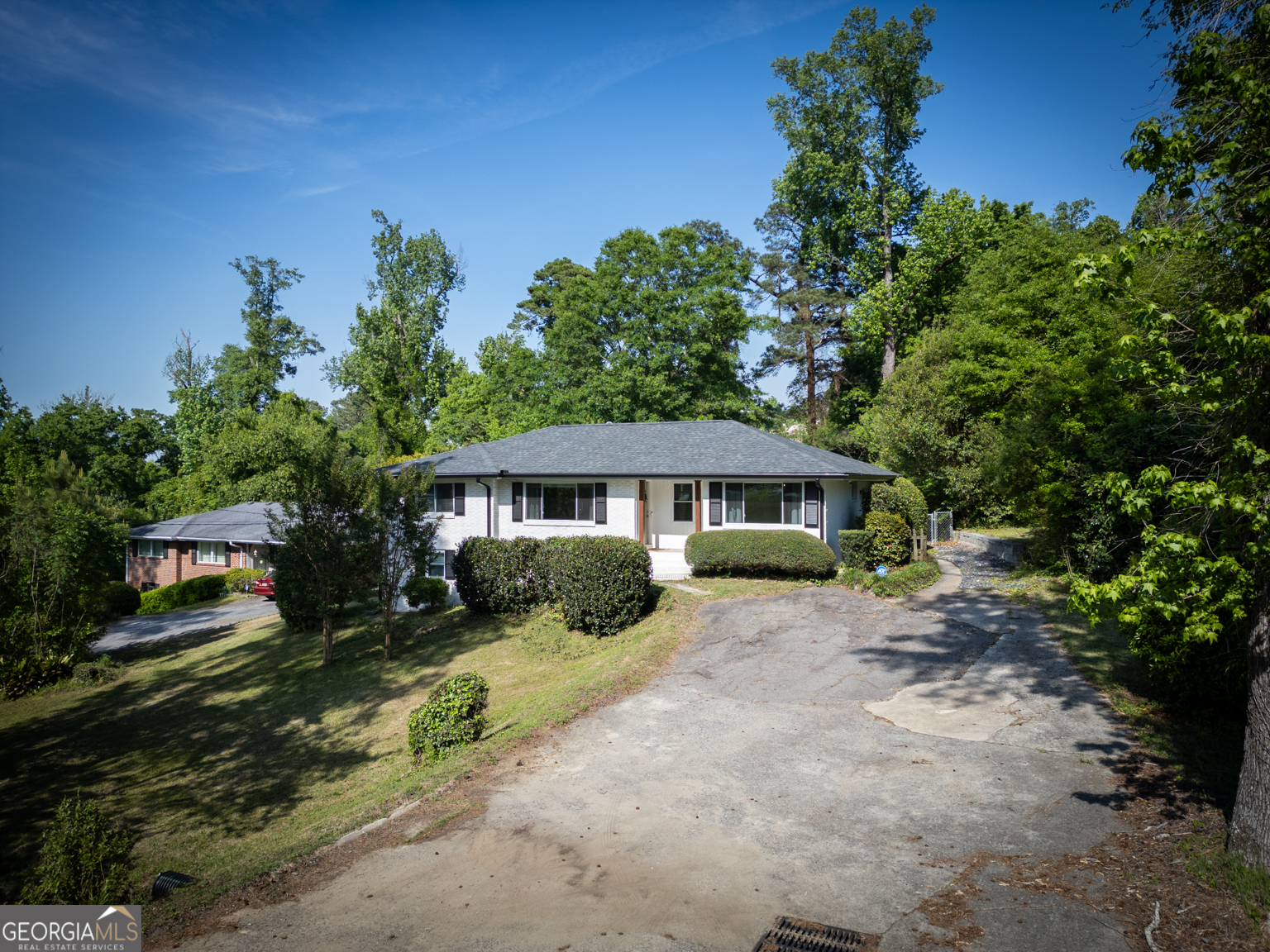 545 Forest Hill Road Macon, GA 31210 - Photo 4 of 63 a view of a house with a yard