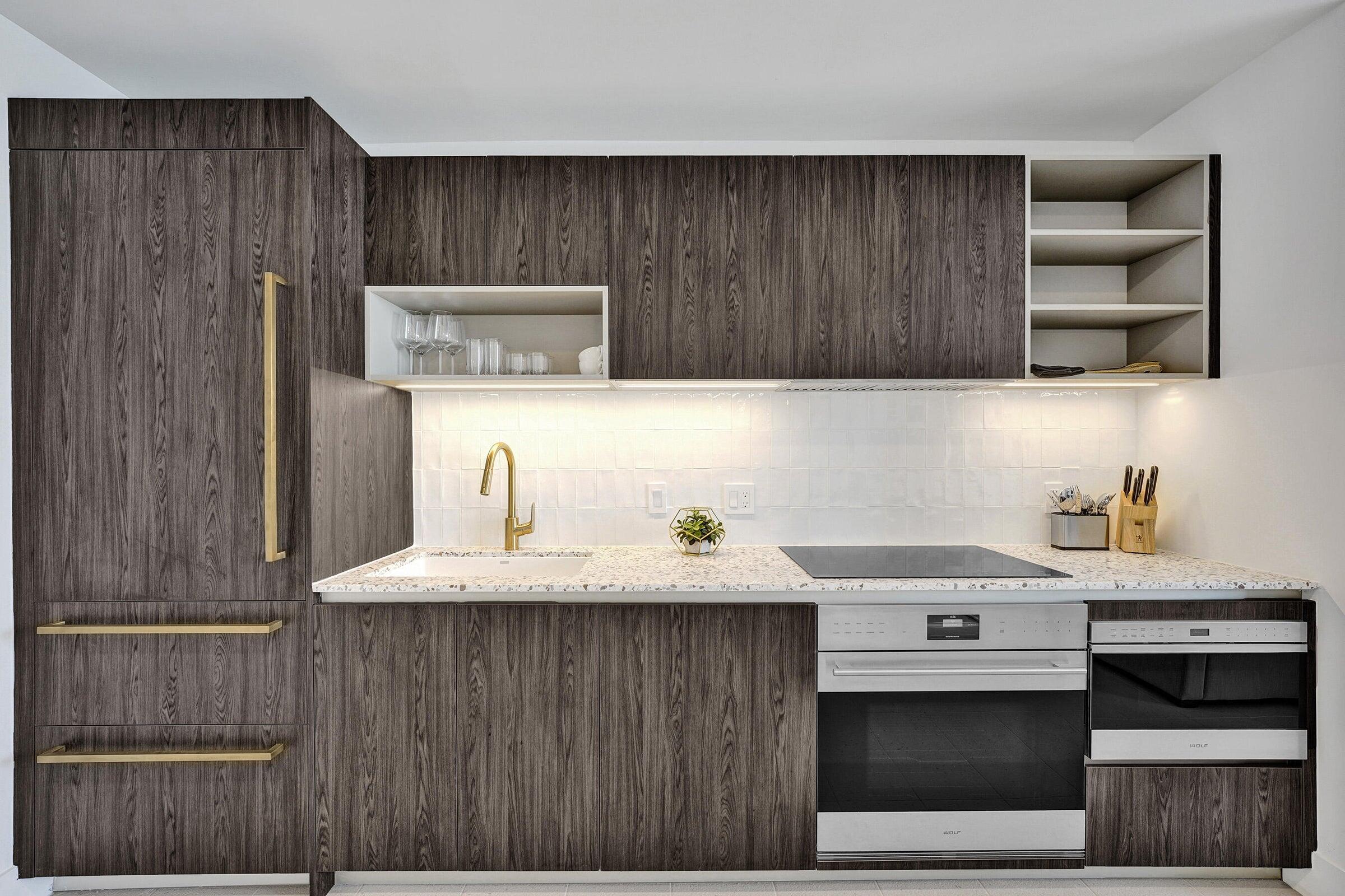 159 Northeast 6th Street, Unit 4813 Miami, FL 33132 - Photo 3 of 34 a kitchen with a cabinets and window