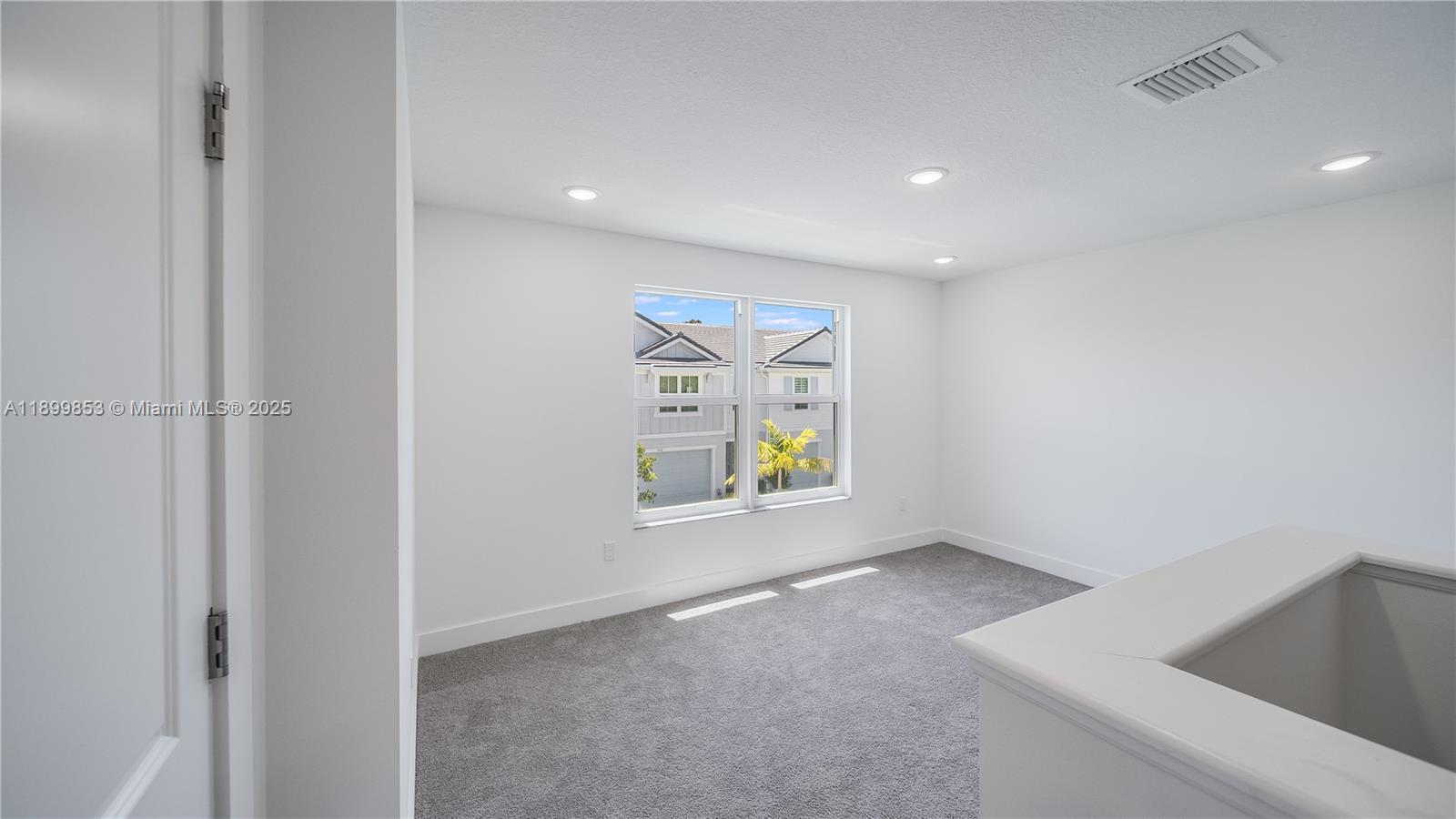 241 Preserve Trail North Stuart, FL 34994 - Photo 16 of 37 a view of an empty room and a window