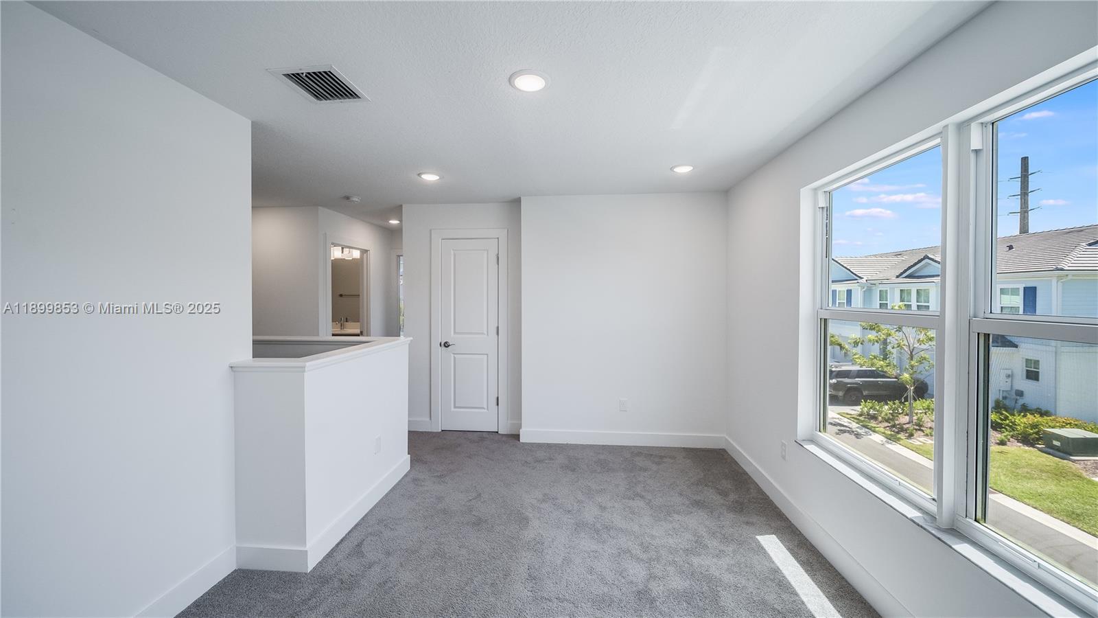 241 Preserve Trail North Stuart, FL 34994 - Photo 18 of 37 a view of hallway with a large window